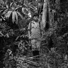 Daniel returns from working one of the small, hidden plots of corn near his settlement. Popular Communities in Resistance (CPR) of the Petén, 1995