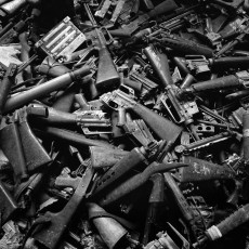 Destroyed weapons that had belonged to combatants of the FMLN guerrilla forces, who had just recently demobilized. Guarjila, Chalatenango, El Salvador, 1993
