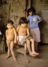 Children with munitions left over from the recently ended civil war. Chalatenango, El Salvador, 1993