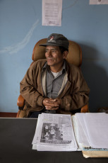 Ezequiel Baldeón with documents regarding his parents’ case. In 1985, soldiers took his father to a military base. Three days later, his mother was detained and disappeared as well. Accomarca, Ayacucho Region, 2014