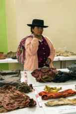 An exhibition of clothing found in the exhumations carried-out in La Hoyada, part of the Cabitos Military Base. Pampa Cangallo, Ayacucho Region, 2014