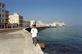 A boy wearing a T-shirt that says “Let’s save Elián.” Havana, 2000
