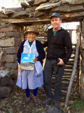 Giving a copy of my book, Paisajes Ausentes, to Antonia, whose photograph and testimony appear in the book. Colcabamba, Ayacucho region, Peru, 2018.
