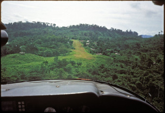 Landing in a small plane in the village of  San Marcos in Quiché province, a community with no road access. From there we went up the Chixoy River a little way to the returned-refugees resettlement community of Copalaa. Guatemala, 1997
