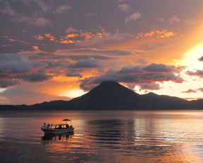 These boats take passengers between different towns on Lake Atitlán. Sololá, Guatemala, 2013